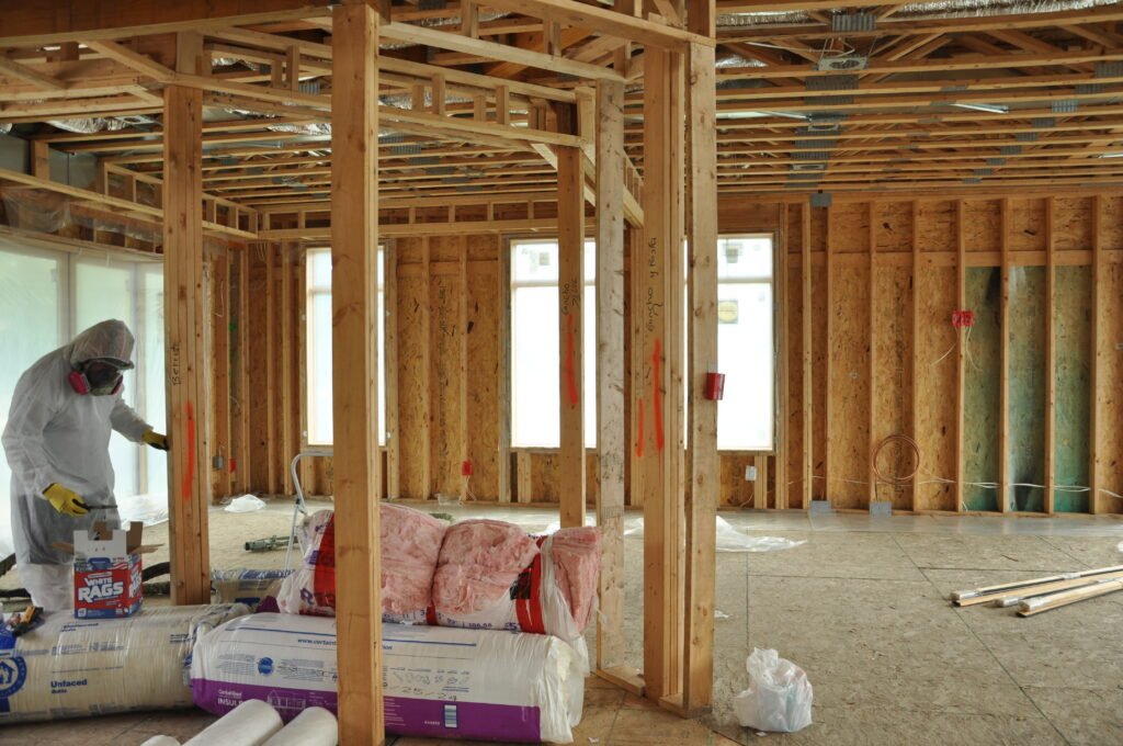 Fiberglass insulation installation project in home basement SFI Plus Fiberglass insulation ready to be installed in a house basement