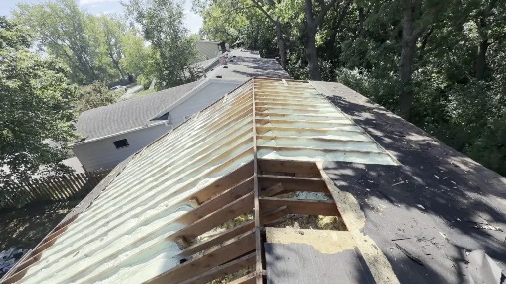 vaulted ceiling spray foam 06 SFI Plus view from roof of newly installed spray foam insulation
